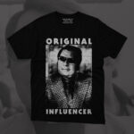 Black Hate Couture t-shirt featuring a stark portrait of cult leader Jim Jones, captioned with the words “Original Influencer” in bold, cynical lettering.
